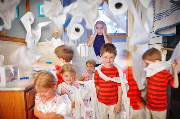 Stress Mother Watching Kids Make a Mess